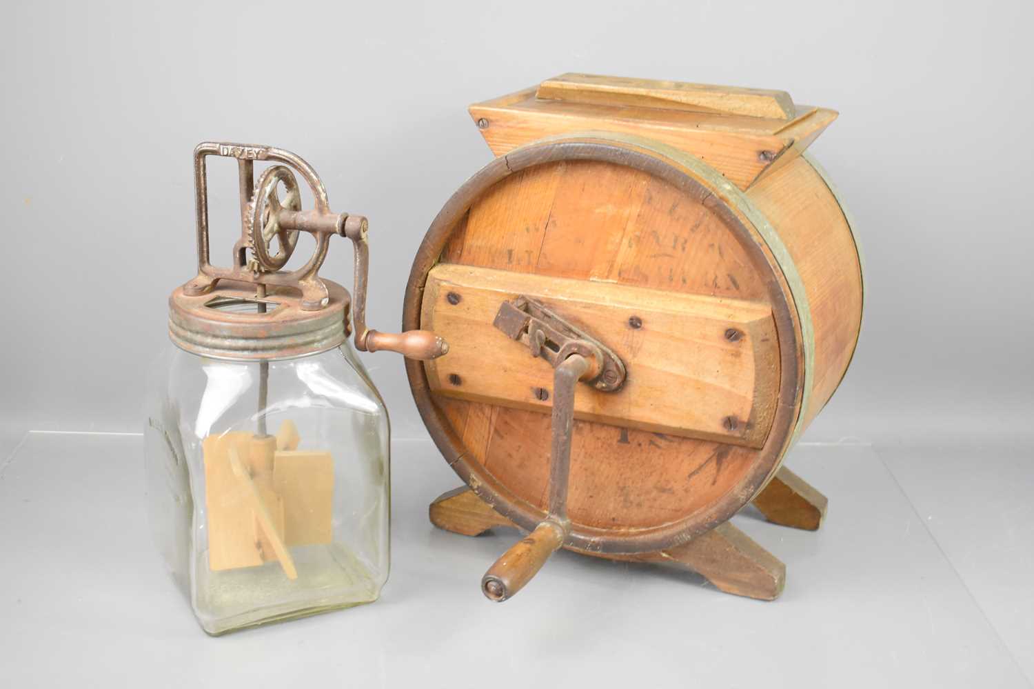 Lot 242 - A vintage wooden butter churn together with a...