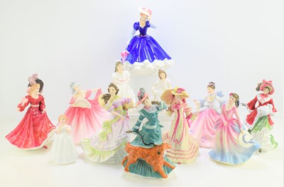 Lot 382 - A group of Royal Doulton figurines to include...