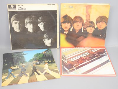 Lot 609 - Four Beatles vinyl record albums comprising of...