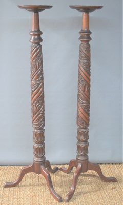 Lot 640 - A pair of carved and spiral turned mahogany...