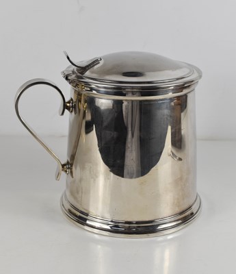 Lot 412 - A silver plated tankard form ice bucket, with...