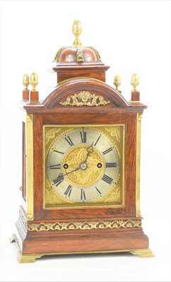 Lot 474 - A walnut and mahogany bracket clock, the domed...