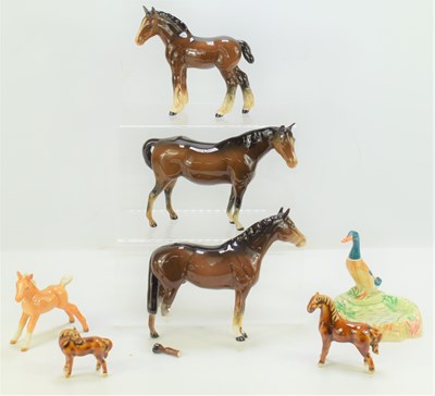 Lot 352 - A group of Beswick ceramic horses together...