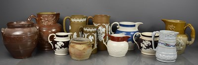 Lot 379 - A large group of antique jugs, to include...