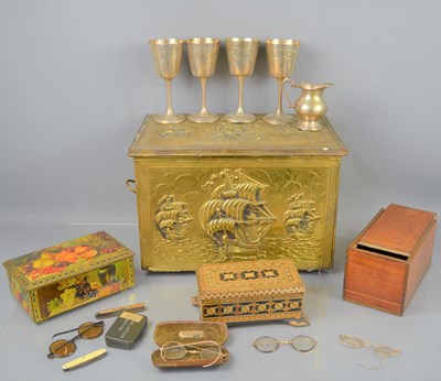 Lot 227 - A brass clad box with embossed decoration...