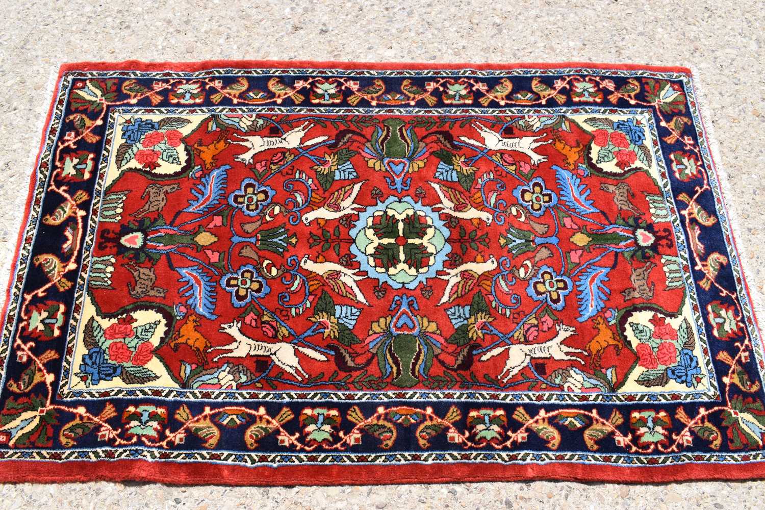 Lot 436 - A fine Middle Eastern wool rug, hand woven in...