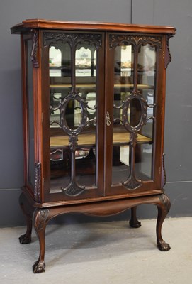 Lot 650 - A late 19th century mahogany glazed display...