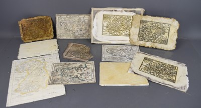 Lot 452 - A group of plasterwork map proofs / casts,...