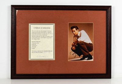 Lot 141 - A David Duchovny signed photograph, framed...