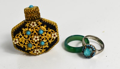 Lot 151 - A jade ring, a silvered and turquoise set ring...