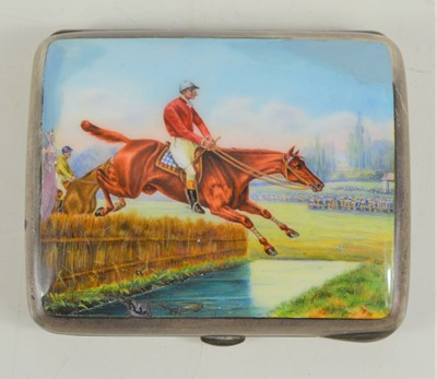 Lot 429 - A silver and enamel cigarette case with horse...