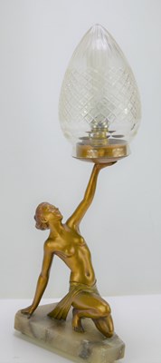 Lot 32 - An Art Deco style spelter lamp of a lady...