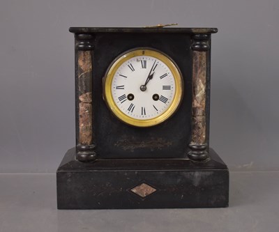 Lot 470 - A Victorian slate mantle clock with marble...