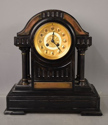 Lot 473 - A Victorian slate mantle clock, the four...