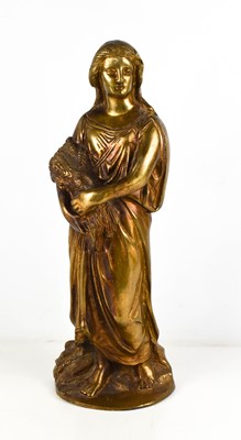 Lot 36 - A gilt bronze early 20th century woman holding...