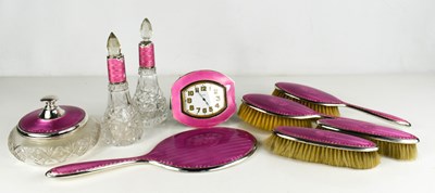 Lot 11 - An Art Deco silver and pink enamelled dressing...
