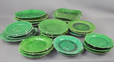 Lot 393 - A large group of Majolica green glazed leaf...