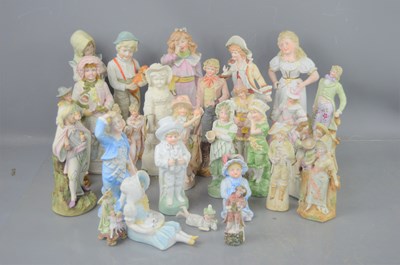 Lot 332 - A large group of ceramic figurines, of various...