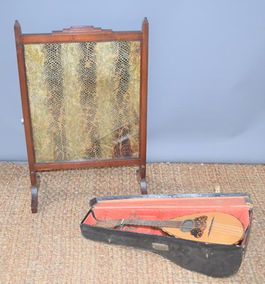 Lot 160 - An Italian mandolin together with a snakeskin...