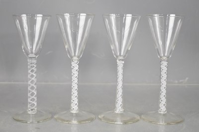 Lot 406 - A set of three very similar Georgian air twist...