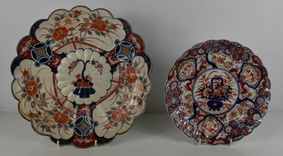 Lot 370 - A 19th century Imari dish, with scalloped edge,...