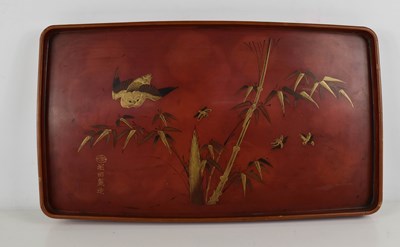 Lot 431 - A Japanese red lacquered tea tray, painted...