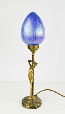 Lot 8 - An Art Nouveau style brass table lamp in the...