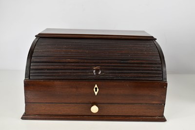 Lot 55 - A 19th century mahogany roll top stationary...
