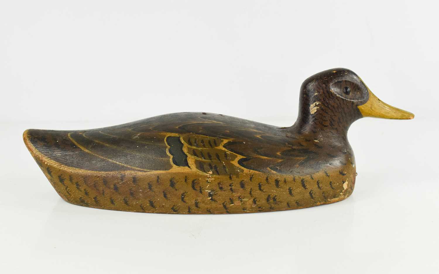 Lot 17 - A wooden carved decoy duck, hand painted with