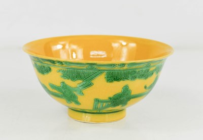 Lot 18 - A Chinese porcelain bowl, in yellow glaze with...