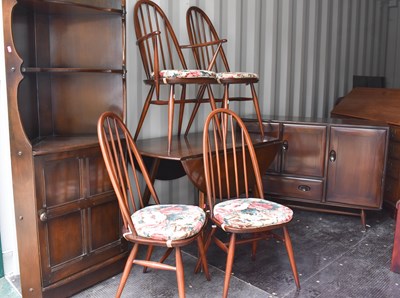 Lot 243 - A group of Ercol furniture to include a corner...