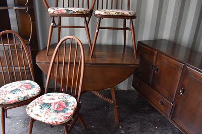 Lot 243 - A group of Ercol furniture to include a corner...