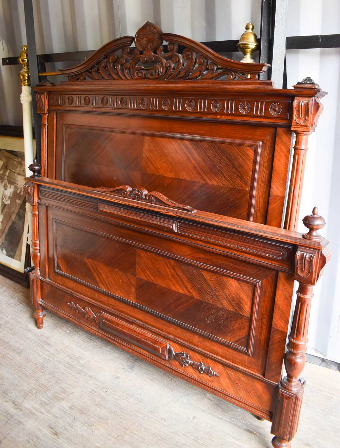 Lot 263 - An Edwardian mahogany French bed head and end...