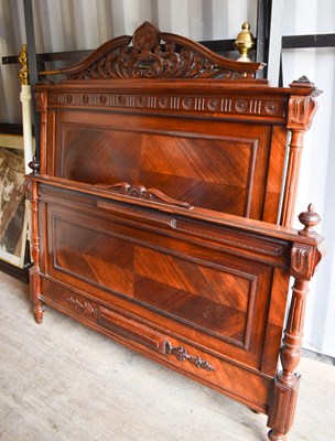 Lot 263 - An Edwardian mahogany French bed head and end...