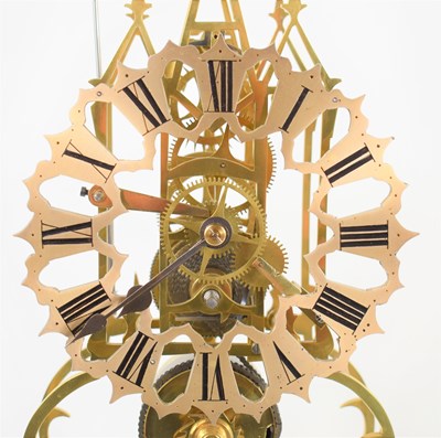 Lot 36 - A Mid 19th Century brass skeleton clock, with...