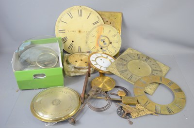 Lot 129 - A group of clock spares to include an 18th...