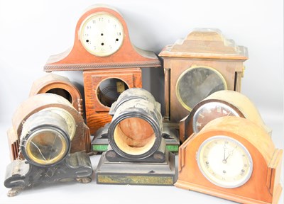 Lot 106 - A group of oak cased mantle clocks to include...