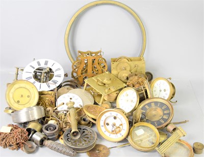 Lot 107 - A large group of clock parts to include dials,...