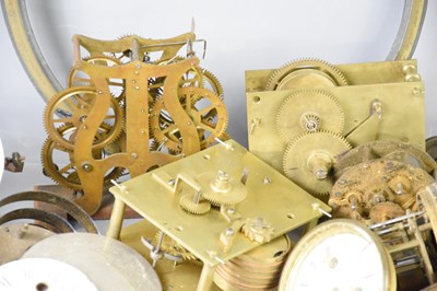 Lot 107 - A large group of clock parts to include dials,...