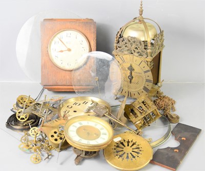 Lot 117 - A group of clock parts and clocks to include a...