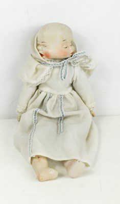 Lot 143 - A vintage bisqe headed three faced doll, with...