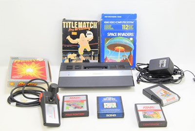 Lot 337 - A vintage Atari 2600 games console and a...