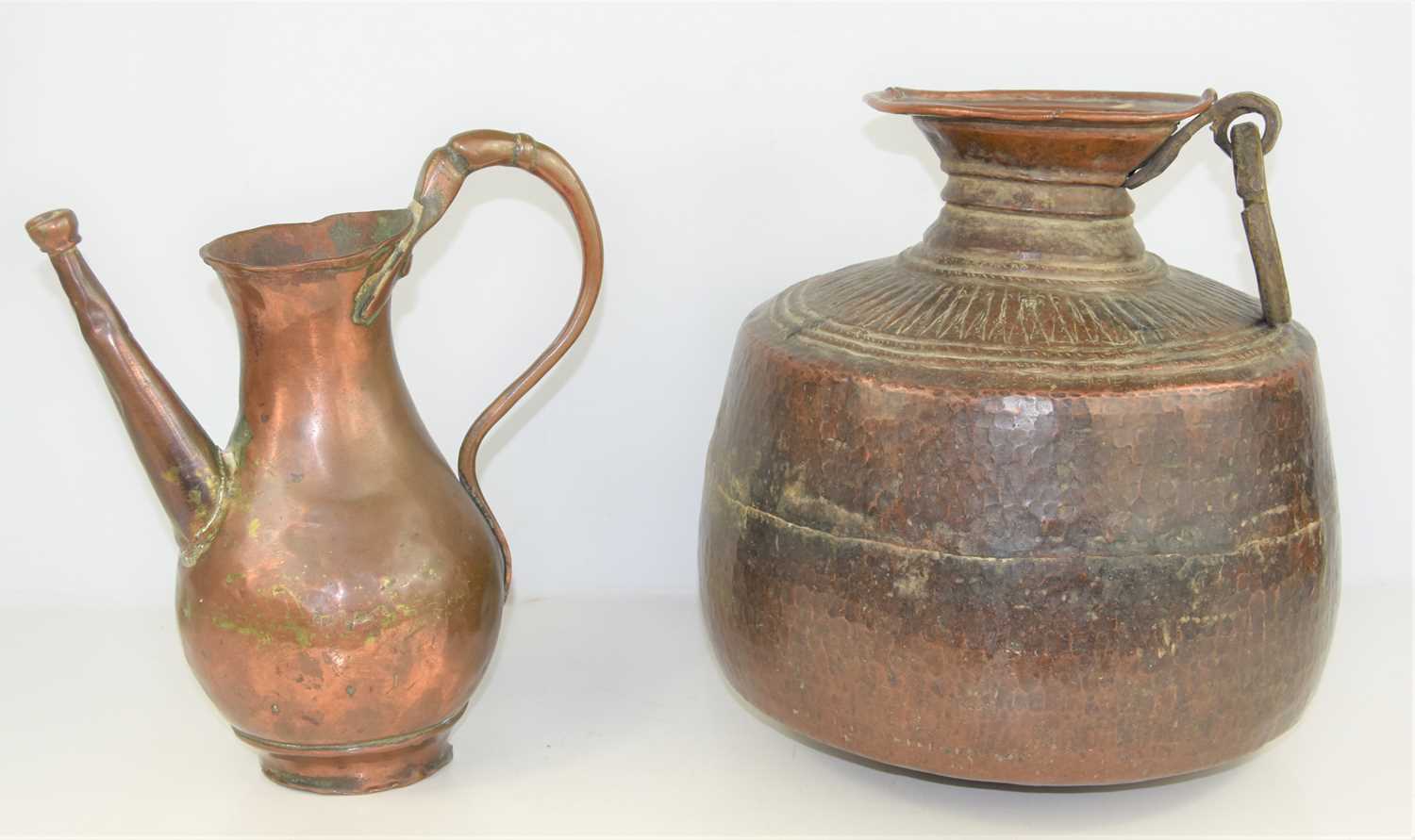 Lot 198 - A 19th century Indian Mughal hammered copper...