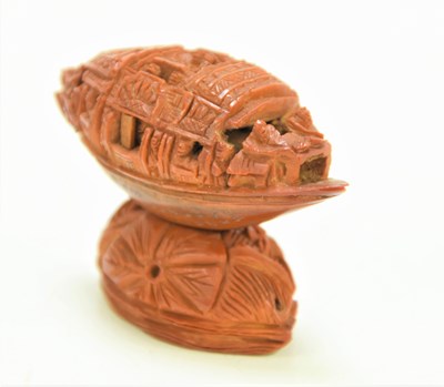 Lot 288 - A Chinese nut boat sculpture on stand,...