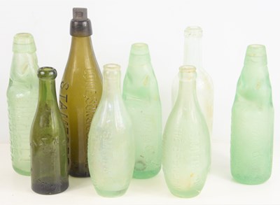 Lot 161 - Local Interest: A group of glass bottles to...