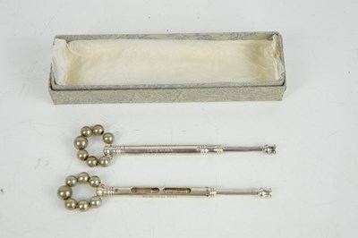 Lot 328 - Two silver lace bobbins to commemorate the...