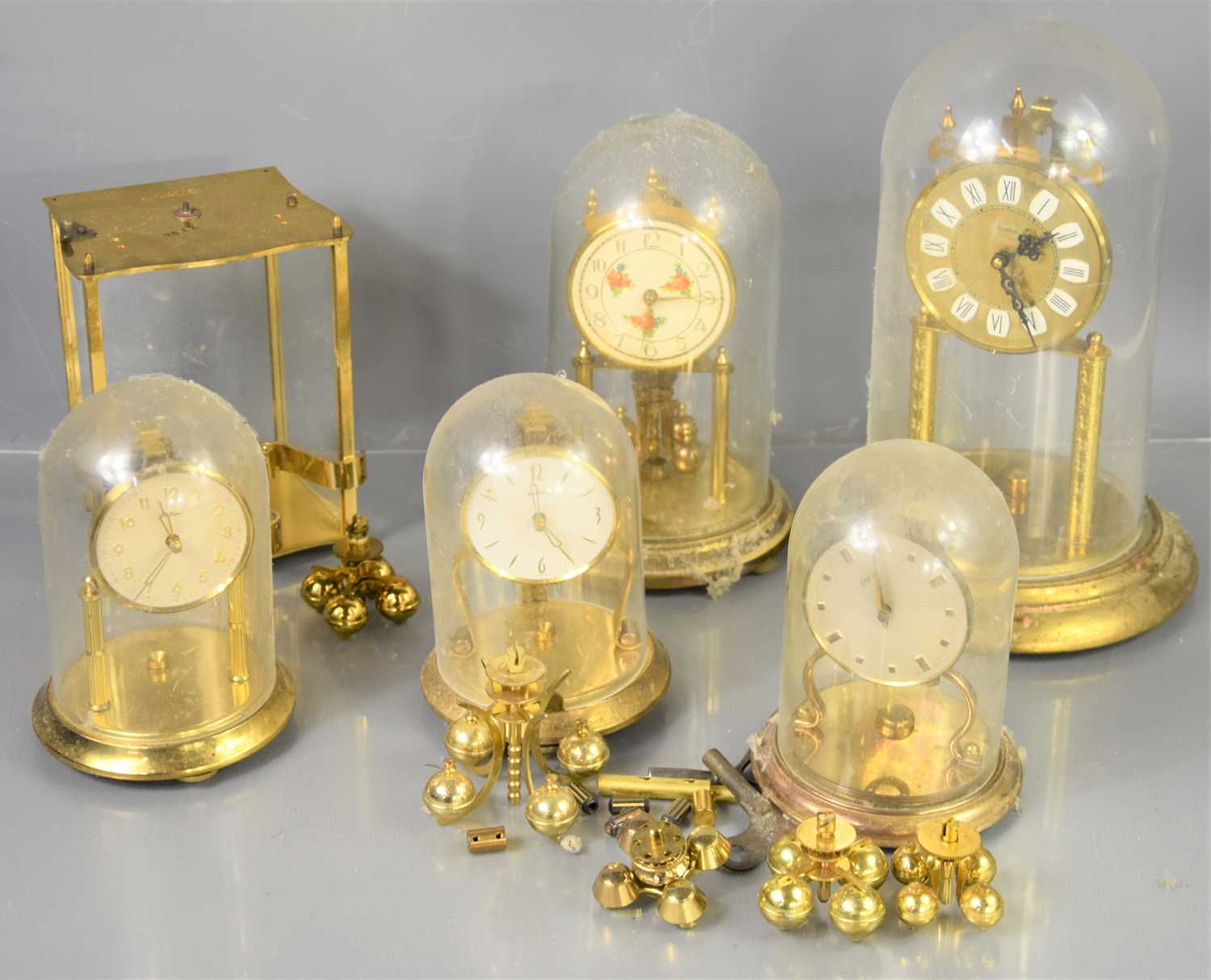 Lot 126 - A group of torsion pendulum clocks to