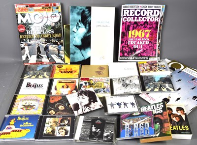 Lot 328 - A group of Beatles memorabilia to include...