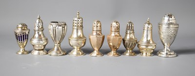 Lot 424 - A group of silver salt and peppers to include...