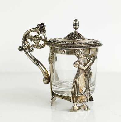 Lot 405 - A Dutch silver and glass jar, the scrolling...